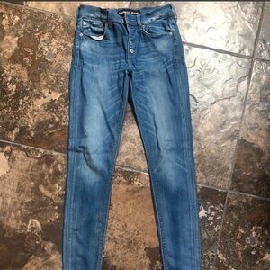 Express button up mid rise legging jeans